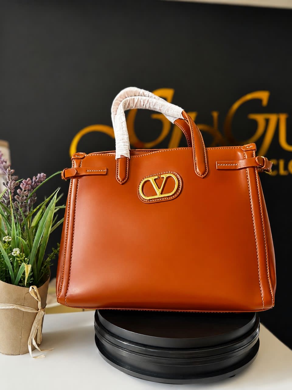 Cognac V-Plaque Belted Tote